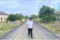 Aspirasi Warga Sepunggur Terwujud, Anggota DPRD Tanbu ini Tinjau Langsung Pengaspalan Jalan