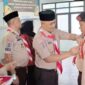 Wabup Tanah Bumbu H. Bahsanuddin Sematkan TISKA kepada Kontingen Pramuka, Tegaskan Pentingnya Prestasi dan Pengabdian